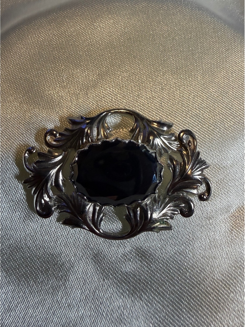 Black stone ornate brooch
